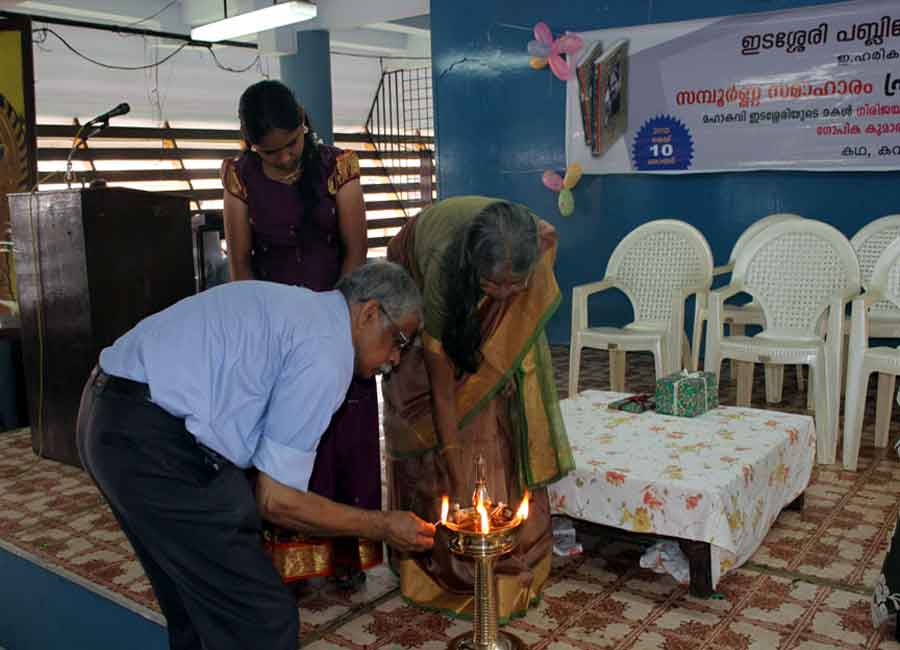 Lighting the lamp by Dr. Divakaran and Girija Radhakrishan  (Brother and Sister of E Harikumar)