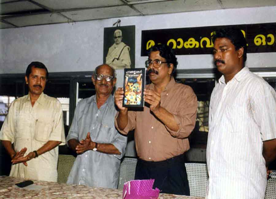 Release of  Pavakkannukal, stories by Mr. K.S.Aniyan (extreme right). Standing next are Mr. C.V. Sreeraman, well-known writer and Mr. M.V. Benny.